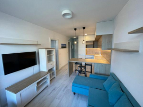 Modern and quiet apartment with air conditioning and private parking